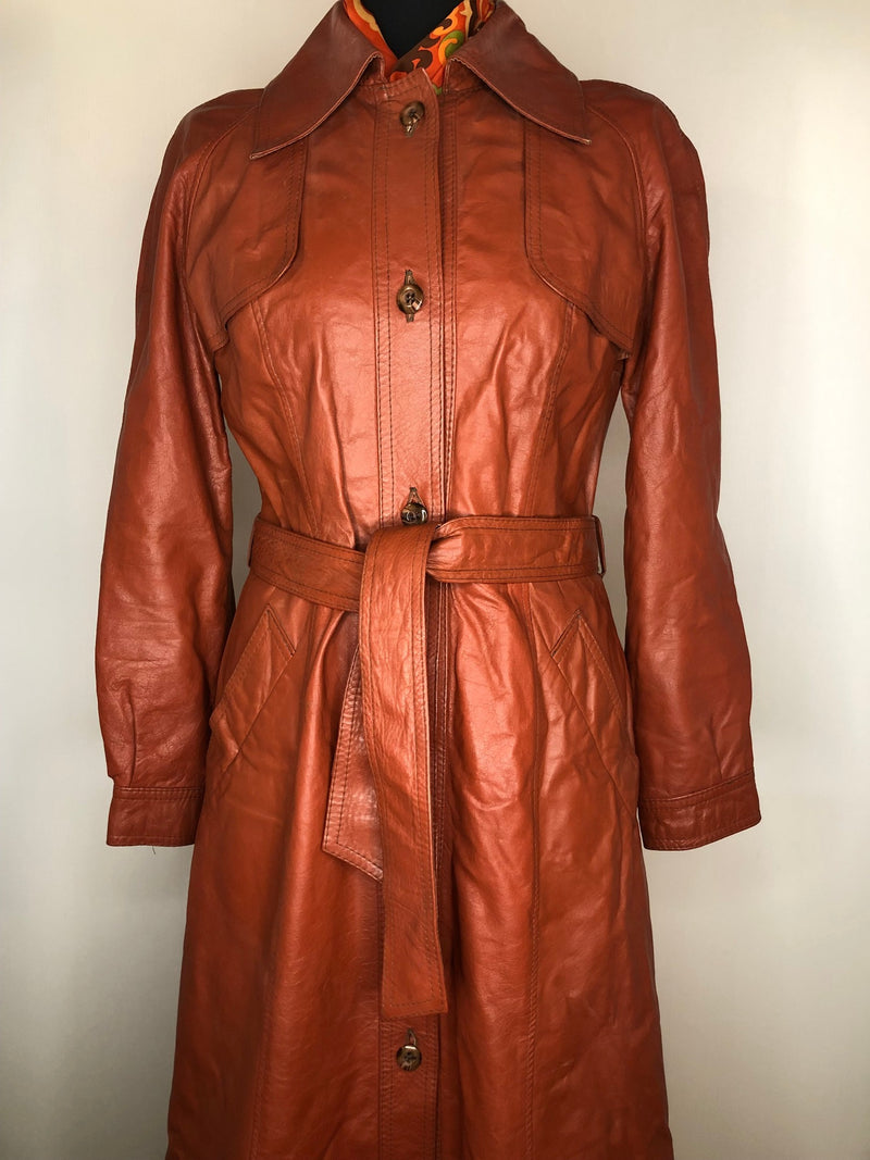 womens jacket  womens coat  womens  waist belt  vintage  Urban Village Vintage  urban village  trench  pockets  long length coat  long  lining  Leather Jacket  Leather  large pointed collar  Jacket  coat  button  brown  Belted waist  belted jacket  belt  70s  70  1970s  10