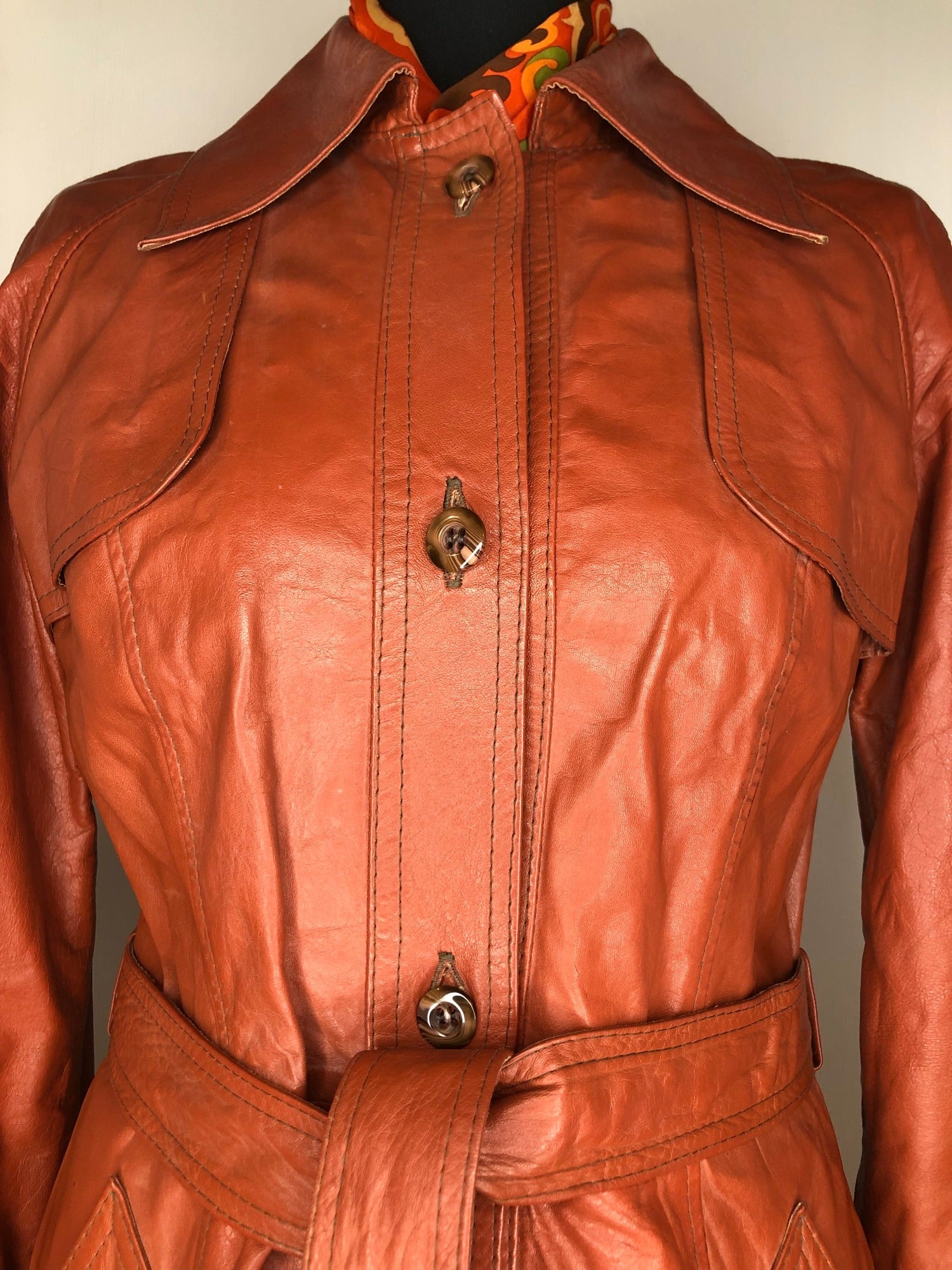 womens jacket  womens coat  womens  waist belt  vintage  Urban Village Vintage  urban village  trench  pockets  long length coat  long  lining  Leather Jacket  Leather  large pointed collar  Jacket  coat  button  brown  Belted waist  belted jacket  belt  70s  70  1970s  10