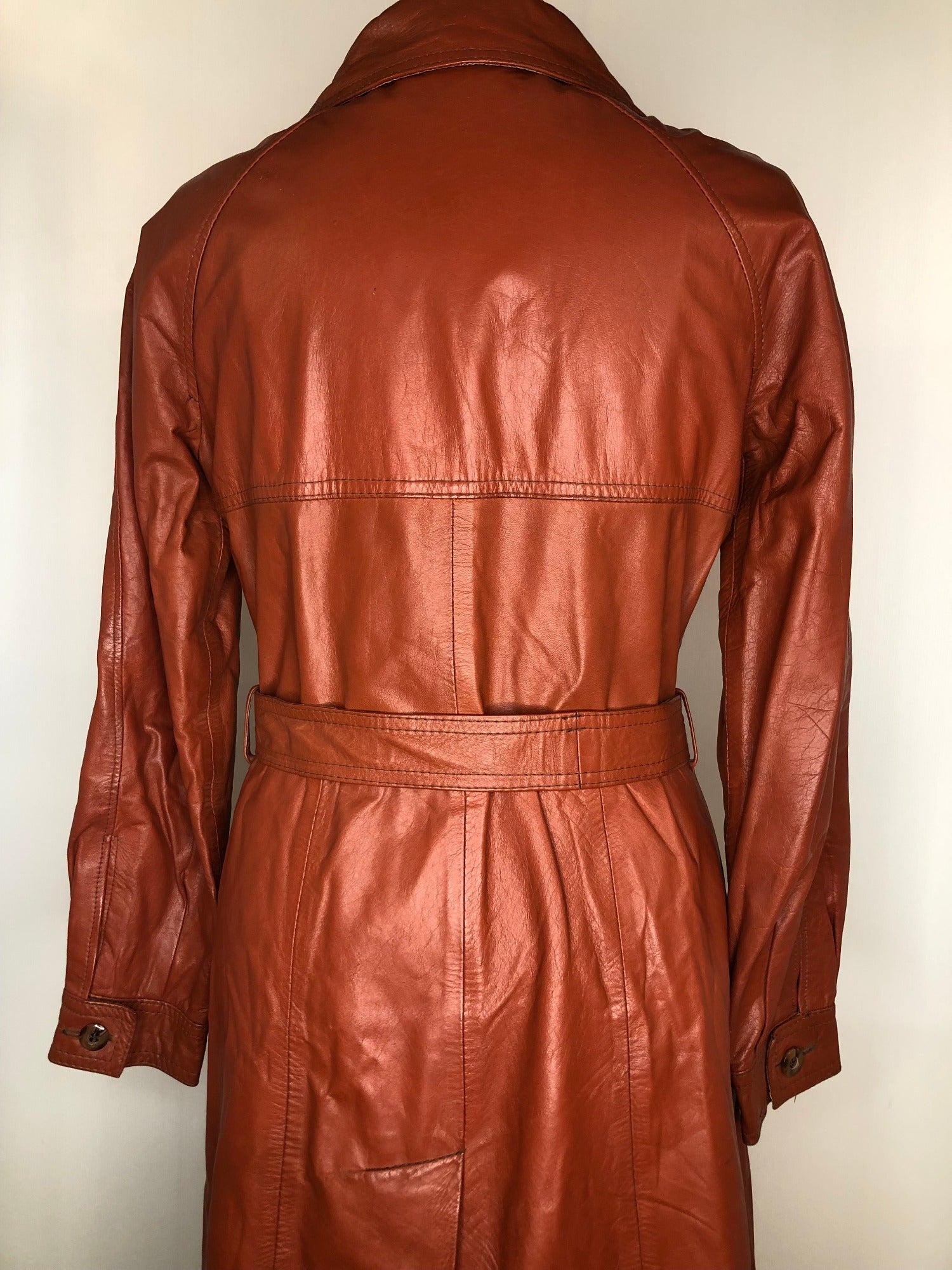 womens jacket  womens coat  womens  waist belt  vintage  Urban Village Vintage  urban village  trench  pockets  long length coat  long  lining  Leather Jacket  Leather  large pointed collar  Jacket  coat  button  brown  Belted waist  belted jacket  belt  70s  70  1970s  10