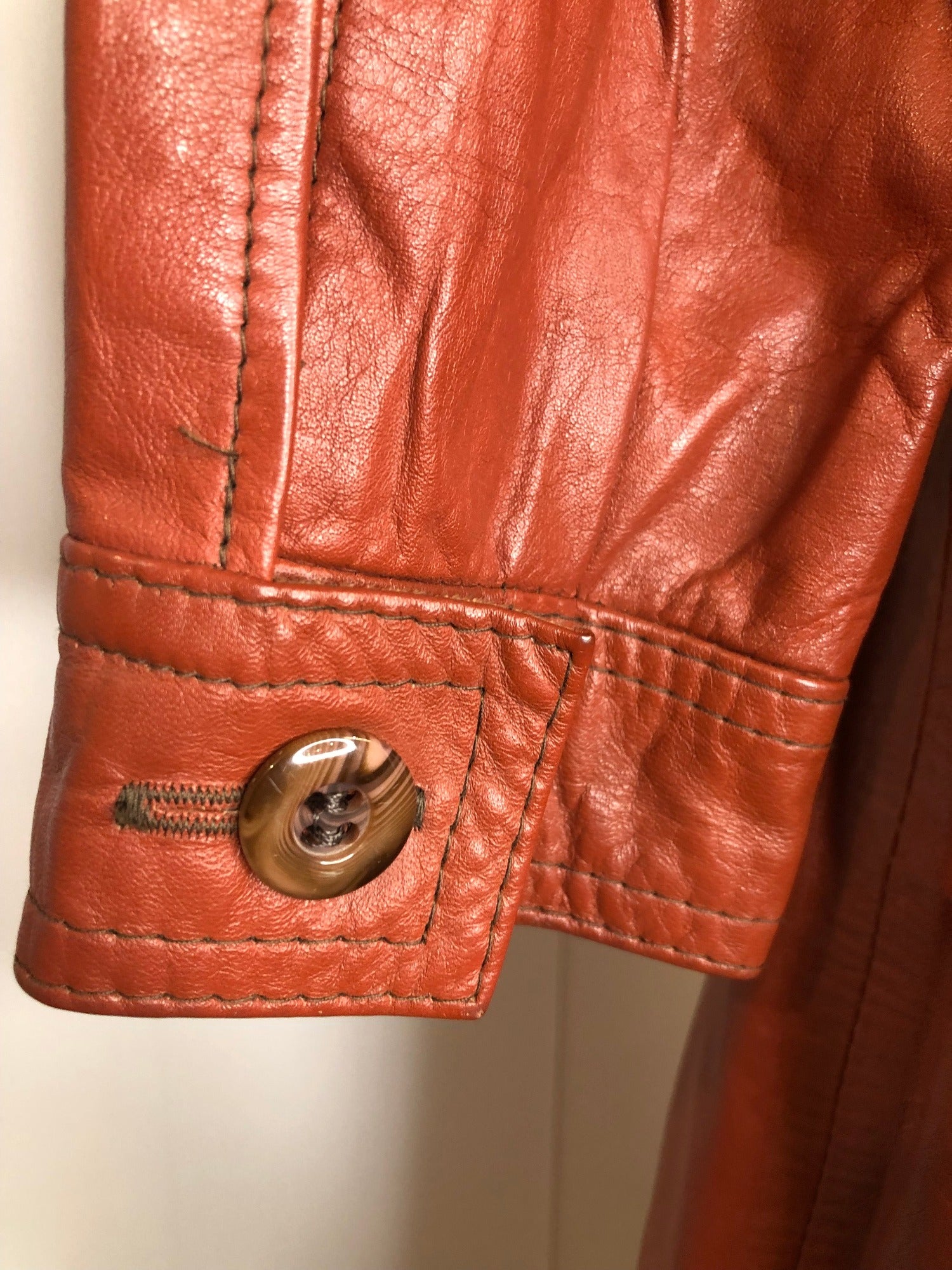 womens jacket  womens coat  womens  waist belt  vintage  Urban Village Vintage  urban village  trench  pockets  long length coat  long  lining  Leather Jacket  Leather  large pointed collar  Jacket  coat  button  brown  Belted waist  belted jacket  belt  70s  70  1970s  10