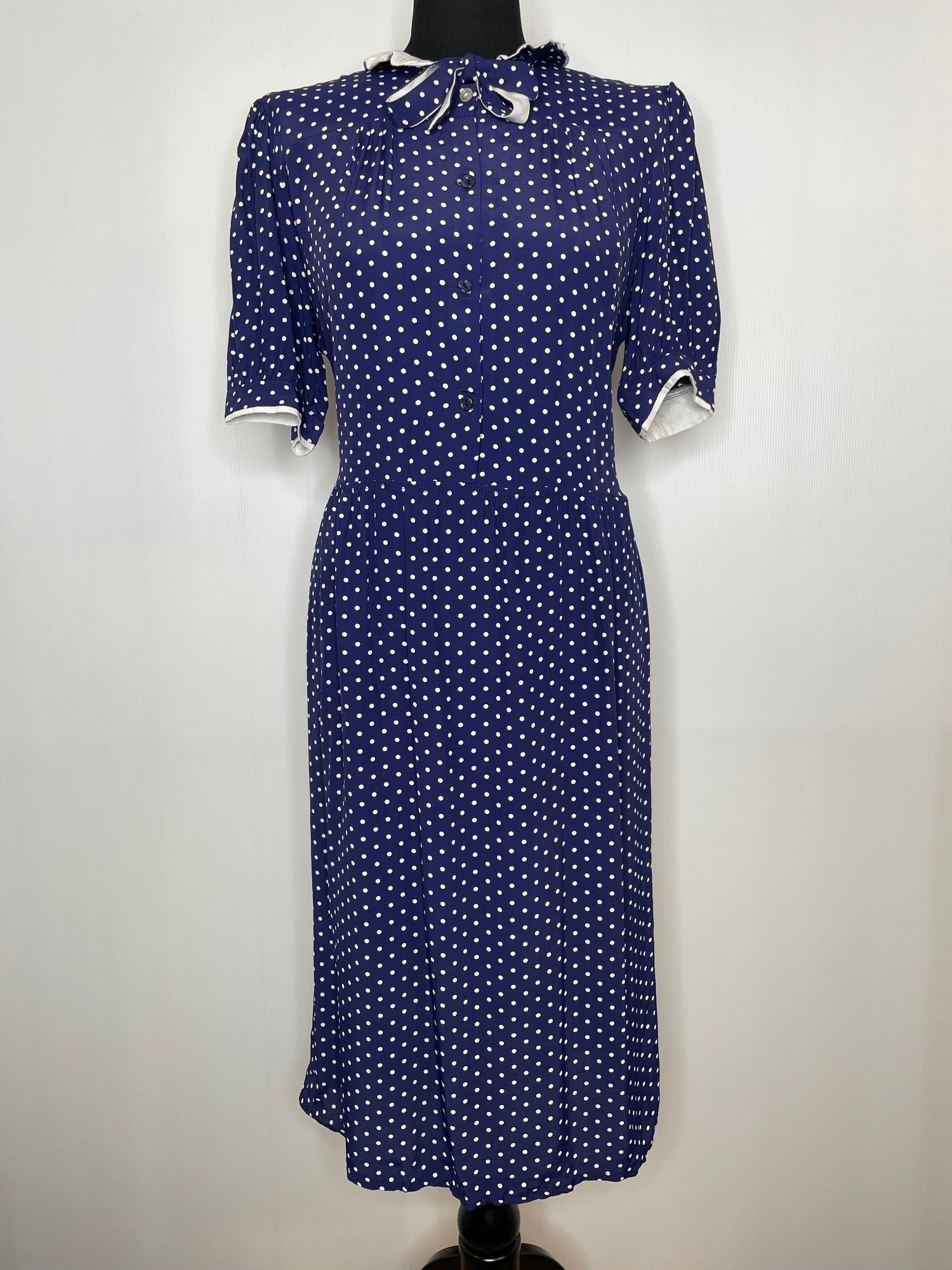 zip back  ww2  WW11  woodstock  womens  white polka dot  white  vintage  urban village  round collar  rockabilly  retro  pussy bow  princess diana  Polka Dot  pin up  neck tie  Navy  long length  long dress  long  bow tie collar  bow tie  Blue  70s  70  1970s  1950s  1940s  14