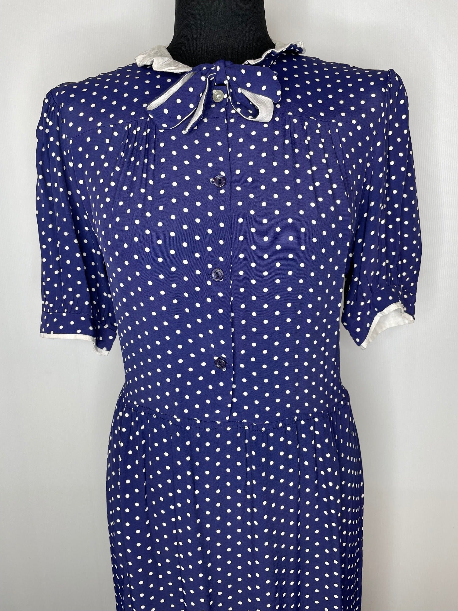 zip back  ww2  WW11  woodstock  womens  white polka dot  white  vintage  urban village  round collar  rockabilly  retro  pussy bow  princess diana  Polka Dot  pin up  neck tie  Navy  long length  long dress  long  bow tie collar  bow tie  Blue  70s  70  1970s  1950s  1940s  14