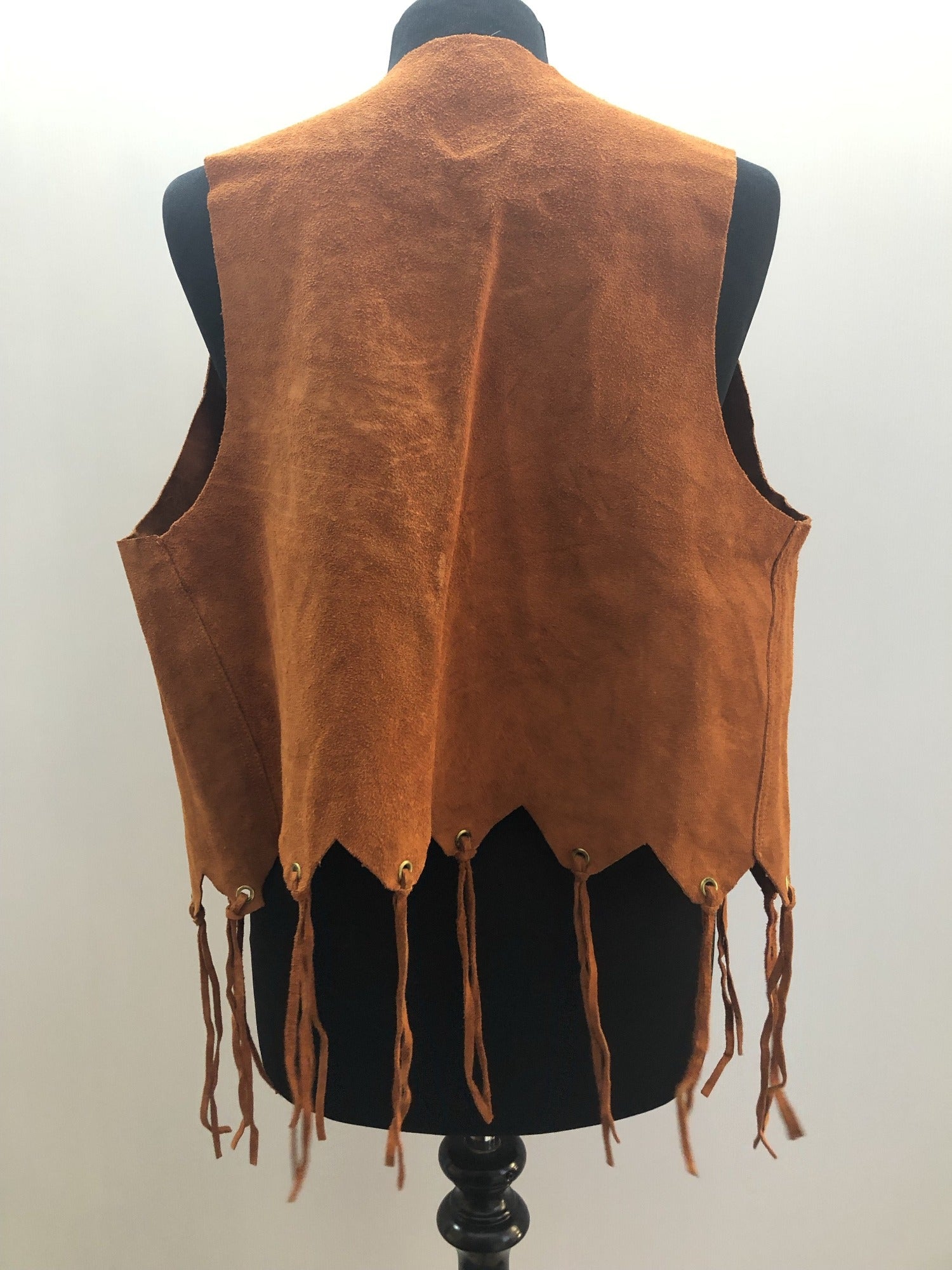 womens  vintage  Urban Village Vintage  urban village  Suede Jacket  suede fringing  Suede  stitch detailing  stitch detail  sleevless  retro  Jacket  fringing  fringed  fringe  festival  decorative pockets  coat  brown  boho  bohemian  70s  1970s  14