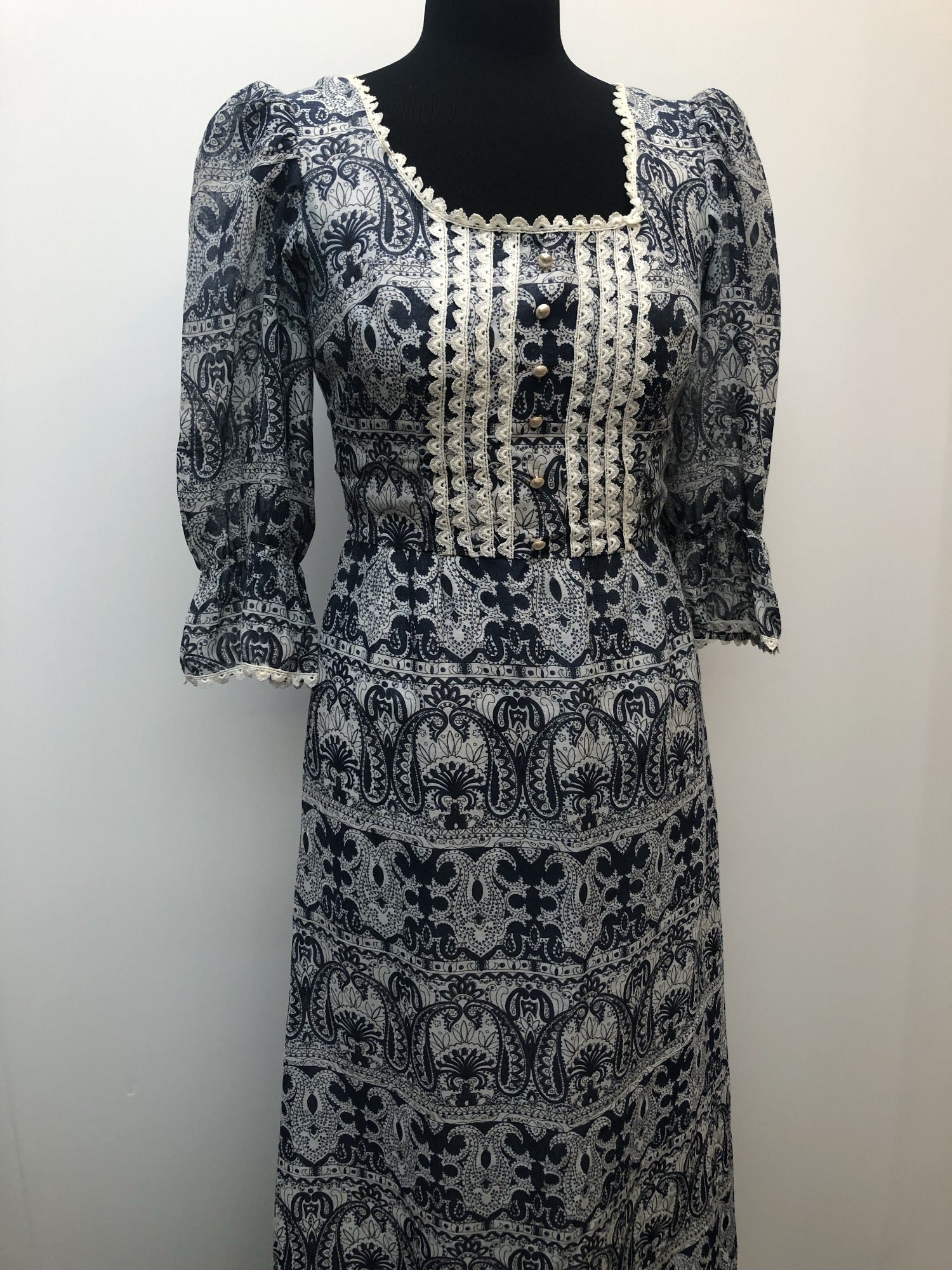 womens  white  vintage  Urban Village Vintage  summer dress  printed dress  pleat detail  maxi dress  long dress  ethnic print  decorative buttons  crochet trim  blue  8  70s  1970s