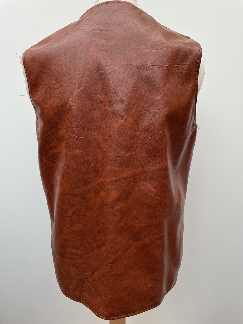 zip front  zip  waistcoat  Vinyl PVC  vintage  Urban Village Vintage  urban village  stitch detailing  stitch detail  sleevless  Sherpa  retro  PVC  polyester  pockets  mens  M  lined  light brown  Leather Jacket  Leather  Jacket  fully lined  fleece lined  Faux Leather  brown  70s  1970s