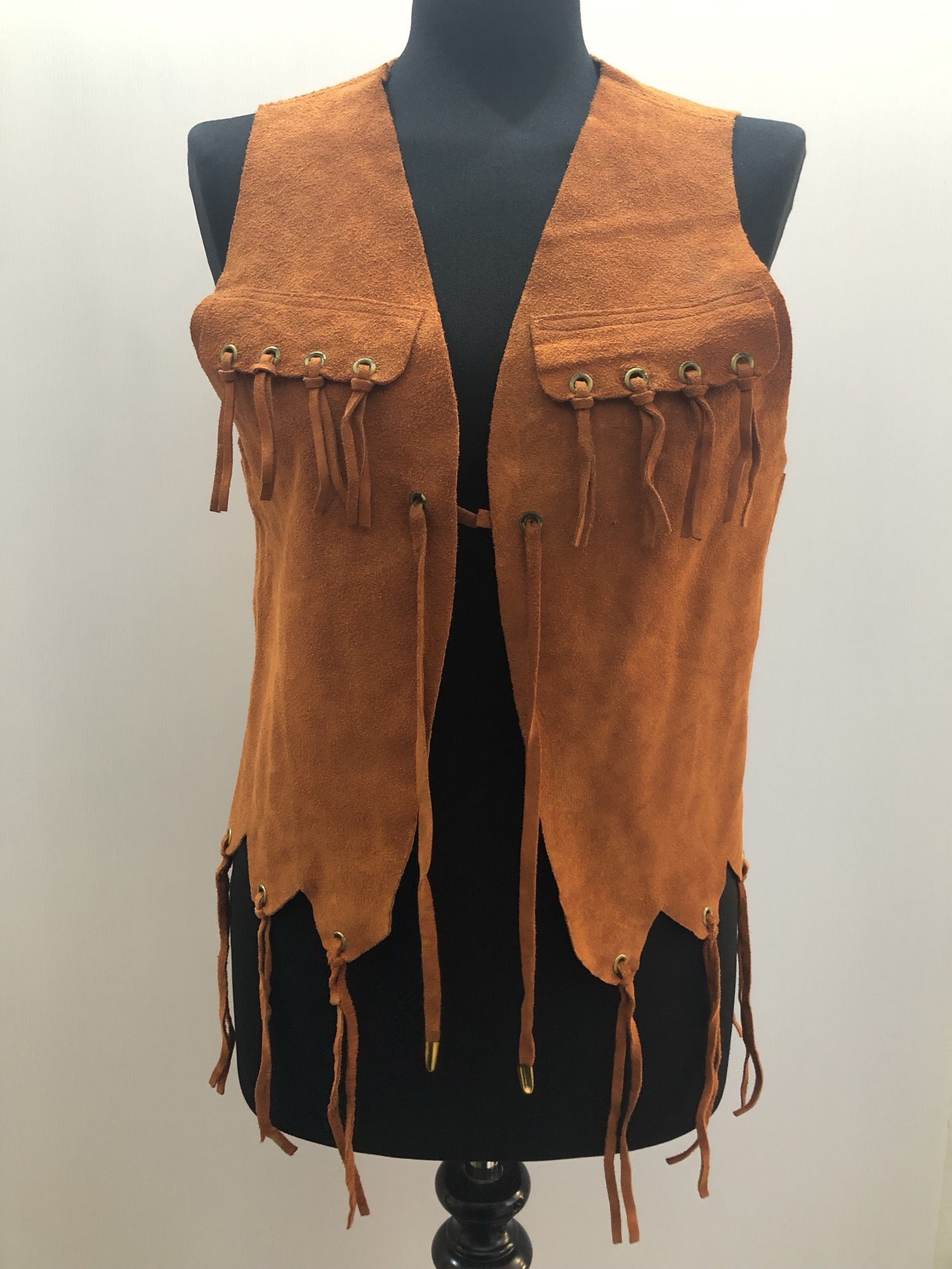 womens  vintage  Urban Village Vintage  urban village  Suede Jacket  suede fringing  Suede  stitch detailing  stitch detail  sleevless  retro  Jacket  fringing  fringed  fringe  festival  decorative pockets  coat  brown  boho  bohemian  70s  1970s  14