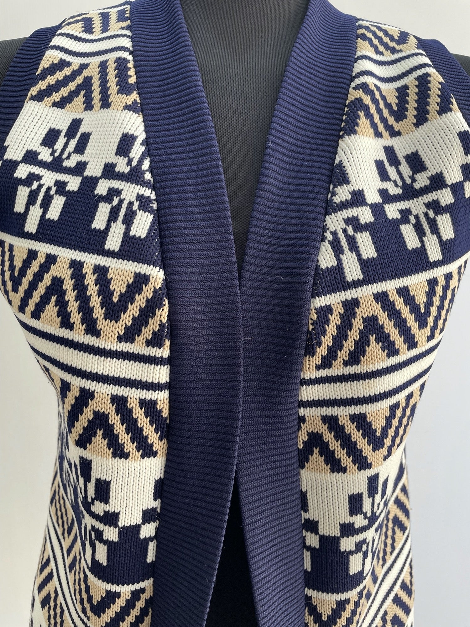 womens  white  waistcoat  vintage  Urban Village Vintage  urban village  sleeveless  patterned  open cardigan  made in england  light knitwear  light knit  knitwear  knitted  knit  elasticated  cardigan  blue  Alison Jane  70s  1970s  10