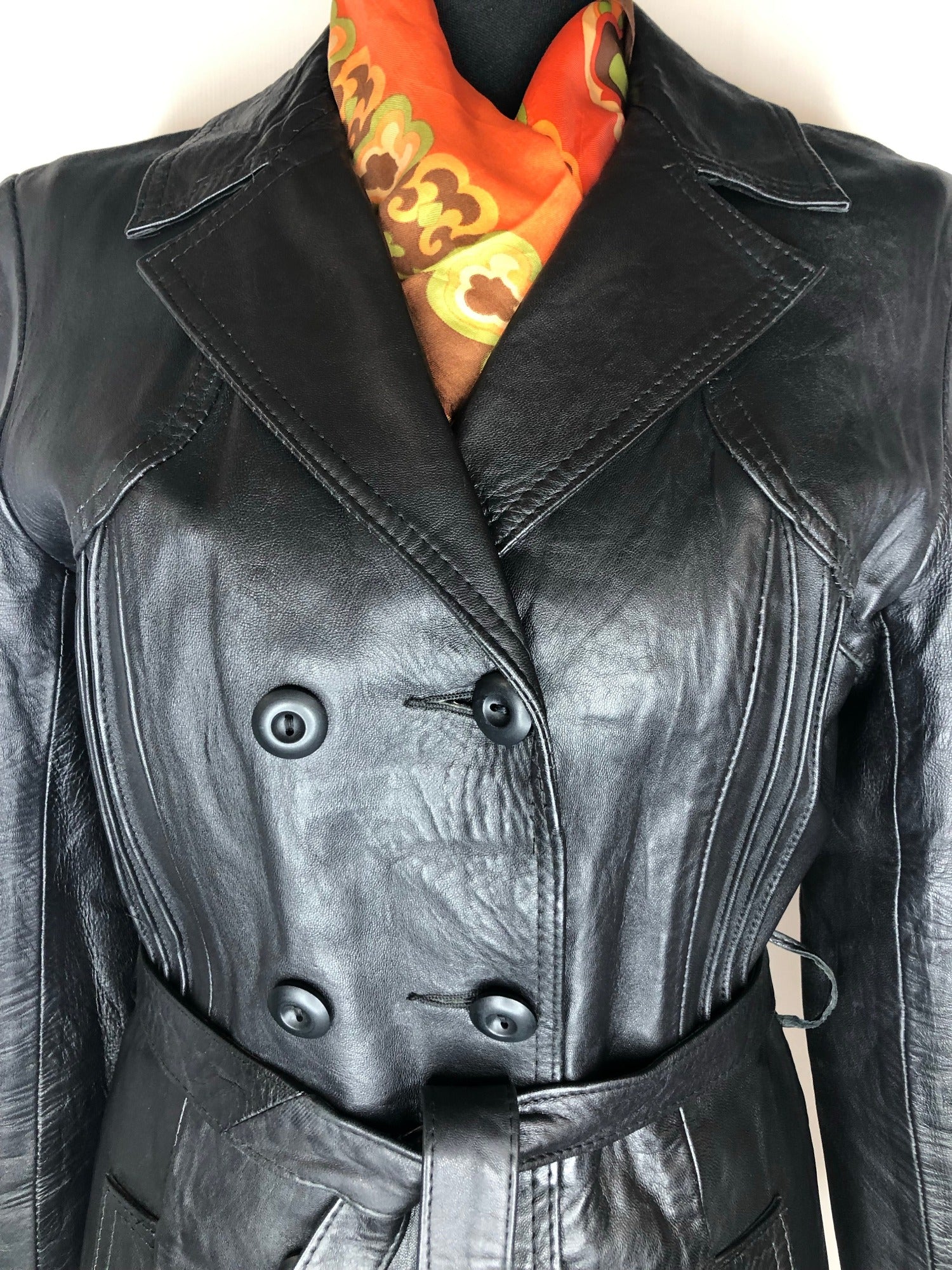 womens jacket  womens coat  womens  waist belt  vintage  Urban Village Vintage  urban village  pockets  pleat back  Leather Jacket  Leather  Jacket  double breatsed  button  black  Belted waist  belted jacket  belt  70s  70  1970s  10