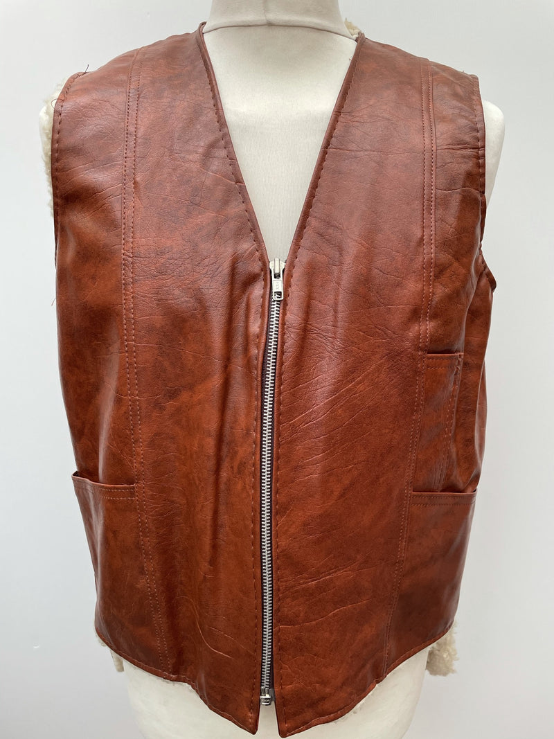 zip front  zip  waistcoat  Vinyl PVC  vintage  Urban Village Vintage  urban village  stitch detailing  stitch detail  sleevless  Sherpa  retro  PVC  polyester  pockets  mens  M  lined  light brown  Leather Jacket  Leather  Jacket  fully lined  fleece lined  Faux Leather  brown  70s  1970s