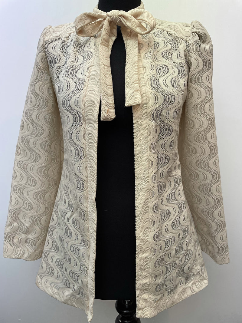 womens  white  vintage  Urban Village Vintage  urban village  swirl  retro  polyester  patterned  pattern  off white  MOD  long sleeve  Jacket  cream  bow tie  bow detail  bow  blouse  bell sleeve  bell  8  70s  1970s