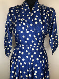 womens  vintage  v-neck dress  urban village  true vintage  three quarter sleeve  summer  side zip  rockabilly  print dress  polka dot print  pleated skirt  pleated  pleat detailing  pleat detail  pin up  fitted waist  dress  day dress  cross over front  Blue  Barbara  50s  1950s  14