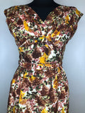 womens  waist belt  vintage  urban village  rockabilly  purple  pleat front  multi  low v back  Kitty Copeland  floral print  floral dress  floral  fitted waist  dress  day dress  crossover front  50s  1950s  10