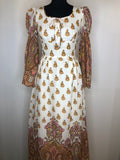 womens  vintage  Urban Village Vintage  retro  maxi dress  maxi  ethnic print  dress  decorative buttons  decorative bow  cream  brown  bell sleeve  8  70s  1970s