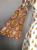 womens  vintage  Urban Village Vintage  retro  maxi dress  maxi  ethnic print  dress  decorative buttons  decorative bow  cream  brown  bell sleeve  8  70s  1970s