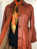 womens jacket  womens coat  womens  waist belt  vintage  Urban Village Vintage  urban village  trench  pockets  long length coat  long  lining  Leather Jacket  Leather  large pointed collar  Jacket  coat  button  brown  Belted waist  belted jacket  belt  70s  70  1970s  10