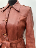 womens jacket  womens coat  womens  waist belt  vintage  Urban Village Vintage  urban village  soft leather  safari style  Safari jacket  safari  retro  pockets  light brown  leather stitch  Leather Jacket  Leather Coat  Leather  Jacket  dagger collar  coat  button down  button  brown leather  brown  big collar  Belted waist  belted jacket  belted  belt  8  70s  70  6/8  6  1970s