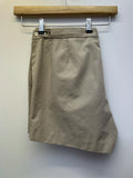Mens original 1980s Fred Perry Sportswear shorts in tan. Zip fastening and waist button fastening adjustment with classic embroidered Fred Perry logo.
