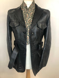 vintage  Urban Village Vintage  urban village  swear and wells  safari  s  pockets  mens  long sleeve  Leather Jacket  Leather  front pockets  chest pockets  Black Leather  Black Jacket  black  Belted waist  belted jacket  belted  belt  70s  1970s