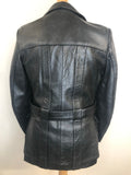vintage  Urban Village Vintage  urban village  swear and wells  safari  s  pockets  mens  long sleeve  Leather Jacket  Leather  front pockets  chest pockets  Black Leather  Black Jacket  black  Belted waist  belted jacket  belted  belt  70s  1970s