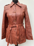 womens jacket  womens coat  womens  waist belt  vintage  Urban Village Vintage  urban village  soft leather  safari style  Safari jacket  safari  retro  pockets  light brown  leather stitch  Leather Jacket  Leather Coat  Leather  Jacket  dagger collar  coat  button down  button  brown leather  brown  big collar  Belted waist  belted jacket  belted  belt  8  70s  70  6/8  6  1970s