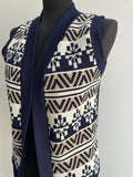 womens  white  waistcoat  vintage  Urban Village Vintage  urban village  sleeveless  patterned  open cardigan  made in england  light knitwear  light knit  knitwear  knitted  knit  elasticated  cardigan  blue  Alison Jane  70s  1970s  10