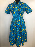 zip  womens  vintage  Urban Village Vintage  urban village  summer dress  side zip  shirt waist  sailor collar  print  pleat detail  floral dress  dress  bow tie collar  blue  50s  1950s  10