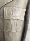 vintage  Urban Village Vintage  urban village  safari style  Safari jacket  safari  retro  pockets  mens  long sleeves  long sleeve  leather stitch  Leather Jacket  Leather Coat  Leather  L  Jacket  decorative buttons  collar  coat  button  brown leather  brown  big collar  70s  70  1970s
