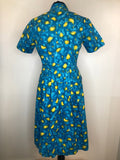 zip  womens  vintage  Urban Village Vintage  urban village  summer dress  side zip  shirt waist  sailor collar  print  pleat detail  floral dress  dress  bow tie collar  blue  50s  1950s  10
