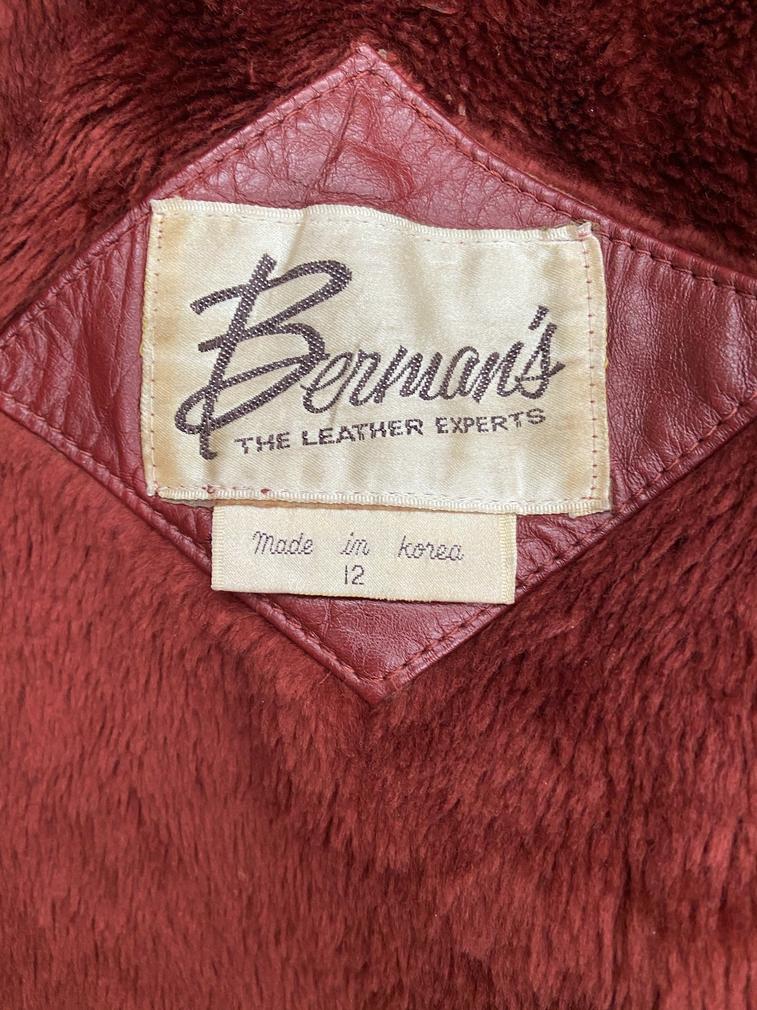 Vintage 1970s Leather Bomber Jacket with Fur Lining by Bermans in Burgundy Size UK 10