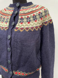 Womens original 1970s cardigan. Knitted material and patterned design with button fastening and round neck.