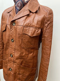Windsor Original  Windsor Leatherwear  vintage  Urban Village Vintage  urban village  tan  soft leather  safari style  Safari jacket  safari  pockets  pocket detail  mens  M  long sleeves  long sleeved  long sleeve  Leather Jacket  Leather Coat  Leather  collared  collar  button up  button front  button  70s  1970s