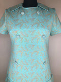 womens  vintage  Urban Village Vintage  round neck  psychedelic  patterned dress  patterned  MOD  mini dress  micro mini  lurex  gold lurex  floral dress  dress  decorative pockets  decorative buttons  blue  back zip  60s  1960s