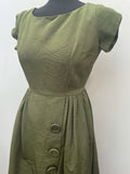 zip  womens  vintage  Urban Village Vintage  urban village  summer dress  short sleeved  short sleeve  round neck  retro  pleated dress  pleated  pleat detailing  pleat detail  midi dress  midi  kneelength  knee length  Green  dresses  dress  decorative buttons  blanes london  Blanes  back zip  50s style  50's  1950s