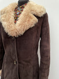 womens coat  womens  Winter Coat  vintage  Urban Village Vintage  urban village  stitch detailing  stitch detail  Sheepskin  shearling  long sleeve  long length coat  long coat  Jacket  dark brown  coat  button down  brown stitch  brown  8  60s  1960s