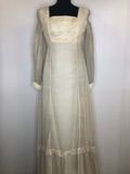womens  white  vintage  victorian style  Urban Village Vintage  prairie dress  prairie  medieval  maxi dress  long sleeve  dress  cream  button front  boho  bohemian  balloon sleeves  balloon sleeve  70s  1970s  10