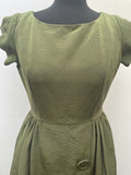 zip  womens  vintage  Urban Village Vintage  urban village  summer dress  short sleeved  short sleeve  round neck  retro  pleated dress  pleated  pleat detailing  pleat detail  midi dress  midi  kneelength  knee length  Green  dresses  dress  decorative buttons  blanes london  Blanes  back zip  50s style  50's  1950s